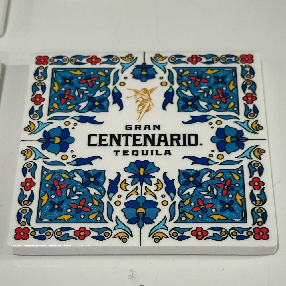 4 set gran Centenario tequila colorful tile coasters. Cork bottom.